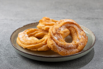 Sugared donuts on the table. Brazilian donuts.
