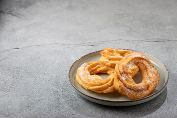 Sugared donuts on the table. Brazilian donuts.