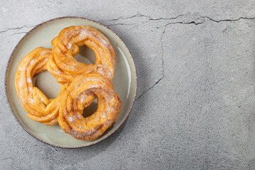 Sugared donuts on the table. Brazilian donuts.