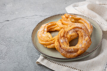 Sugared donuts on the table. Brazilian donuts.