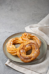 Sugared donuts on the table. Brazilian donuts.