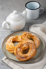 Sugared donuts on the table. Brazilian donuts.
