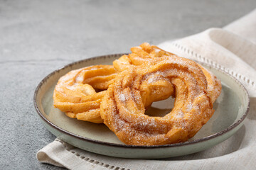 Sugared donuts on the table. Brazilian donuts.