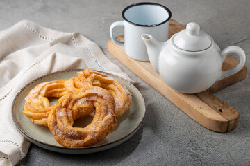 Sugared donuts on the table. Brazilian donuts.