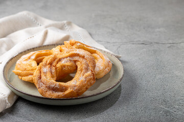 Sugared donuts on the table. Brazilian donuts.