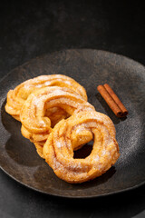 Sugared donuts on the table. Brazilian donuts.