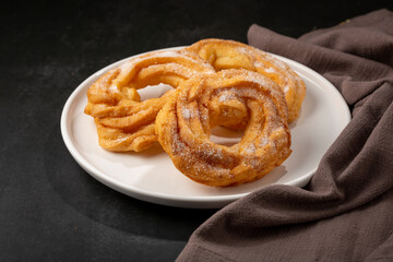 Sugared donuts on the table. Brazilian donuts.