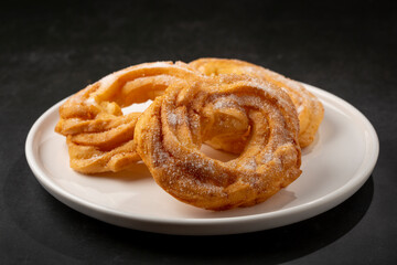 Sugared donuts on the table. Brazilian donuts.