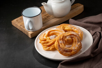 Sugared donuts on the table. Brazilian donuts.