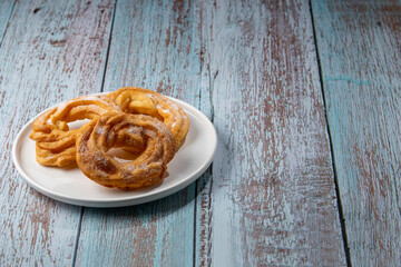 Sugared donuts on the table. Brazilian donuts.