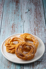 Sugared donuts on the table. Brazilian donuts.