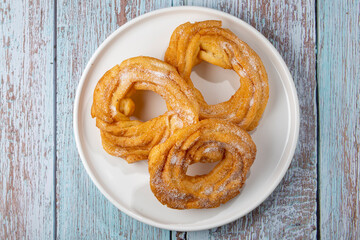 Sugared donuts on the table. Brazilian donuts.