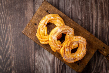 Sugared donuts on the table. Brazilian donuts.
