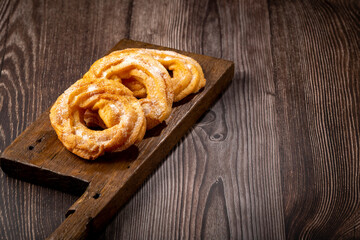 Sugared donuts on the table. Brazilian donuts.