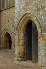 Fototapeta na wymiar Two arched doorways in a castle building
