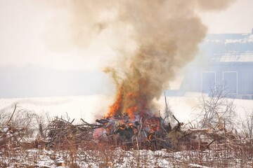 Controlled Burn on a Farm Property where Forest has been Cut Down to make more Arable Farmland
