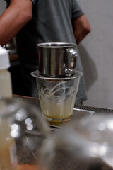 Fototapeta na wymiar barista making coffee with the vietnam drip method