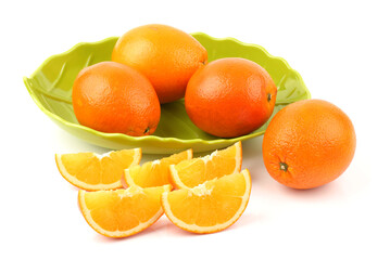 Whole orange fruit and  segments or cantles isolated on white background cutout