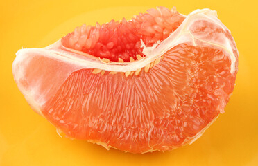 peeled pomelo pieces  background. Tasty fresh fruit eating concept