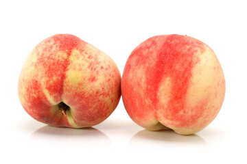 ripe peach on white background