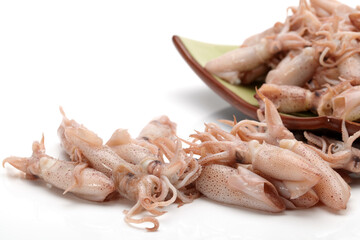 Small Freshly Steamed Squids On White background