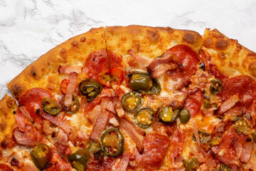Mexican style pizza with jalapeno pepper and bacon