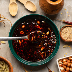 Chili oil sauce with sesame and peanuts called macha. Mexican food - obrazy, fototapety, plakaty