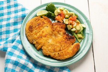 Crispy chicken fillets with salad. Healthy food