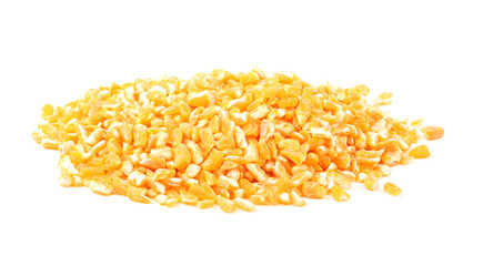 raw crushed corn groats close up