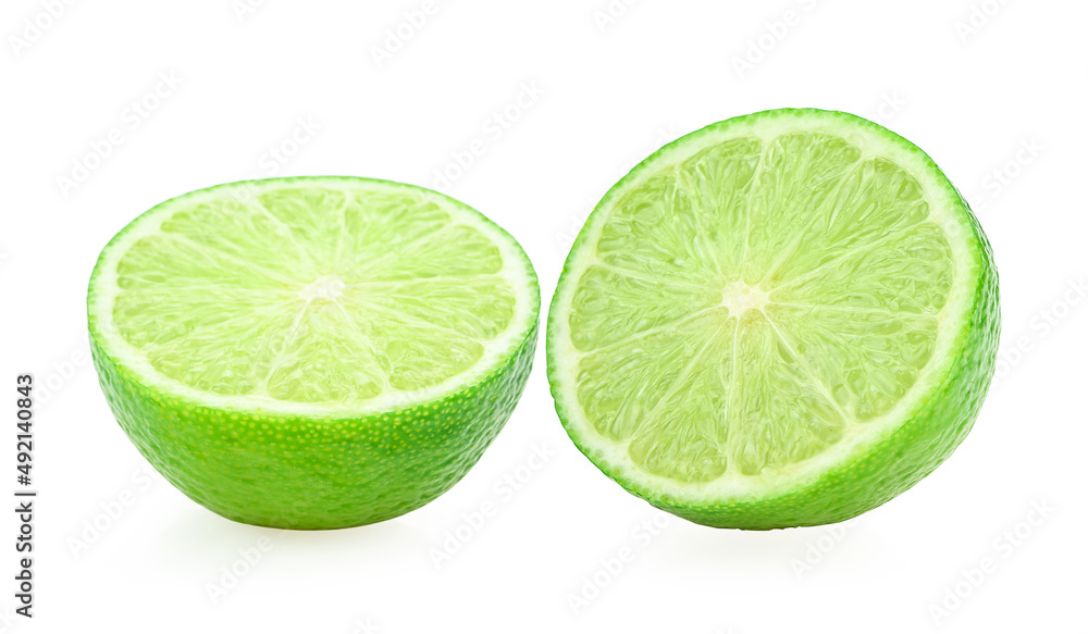 Wall mural green lemon on white background