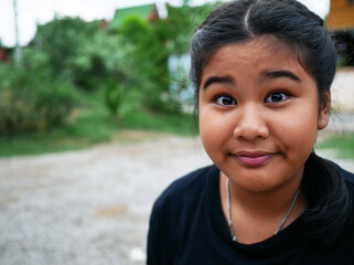Asian girl smiling and happy with outdoor.