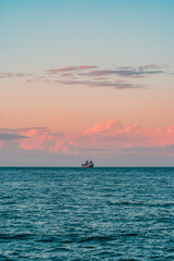 Fototapeta na wymiar Ship in the sunset