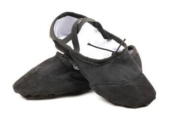 Black ballet slippers worn while dancing ballet