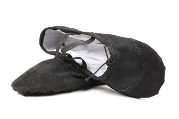 Black ballet slippers worn while dancing ballet