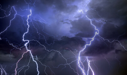 Lightnings, thunder and rain on a stormy summer night
