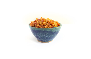 Dehydrated Carrot  Chunks in Blue Pottery Bowl