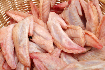 Raw chicken wings on White background