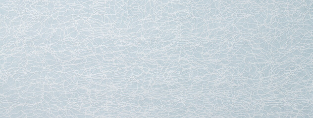 Obraz premium 網目模様のパターンのあるグレーの紙の背景テクスチャー