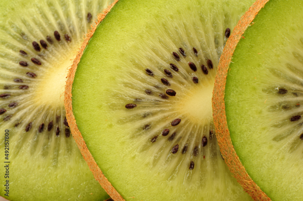 Wall mural kiwi fruit on white background 