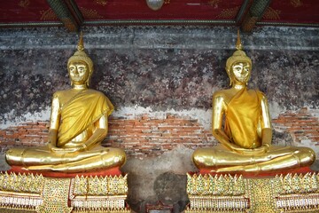Every Buddha statue is coated in gold color at Wat Suthat Thepwararam, a temple near the Giant Swing (Sao Chingcha) in Bangkok.