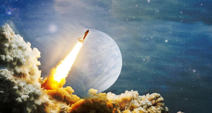 Spaceship flight.Space shuttle launch in the clouds to outer space. Dark space with stars on background. Elements of this image furnished by NASA