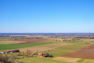 Farm in a beautiful countryside view in springtime