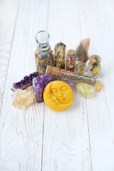 Symbolic moon amulet, magic gemstones, spell witch jars with dry herbal and crystals. Esoteric,...