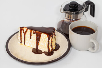 hot coffee in cup and cake