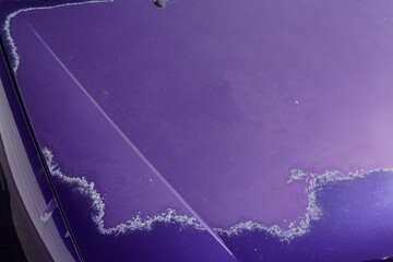 old car purple bonnet engine hood blue violet used paint worn by time season and sun faded grunge...