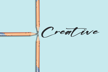 Creative text concept with pencil isolated on blue background