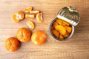 Canned tangerine. Pickled mandarin fruit in can.