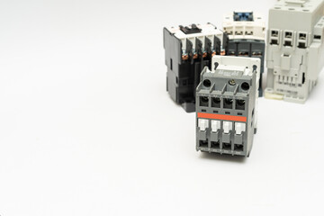 Magnetic contactor with Overload Relay isolate on white background. The magnetic contactors used to...