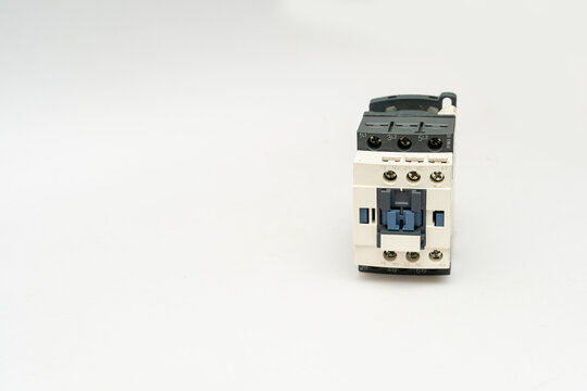 Magnetic contactor with Overload Relay isolate on white background. The magnetic contactors used to control the distribution of power in lighting and heating circuits.