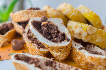 Oriental sweets, pastille roll with sherbet and nuts. Sweet dessert. Soft focus